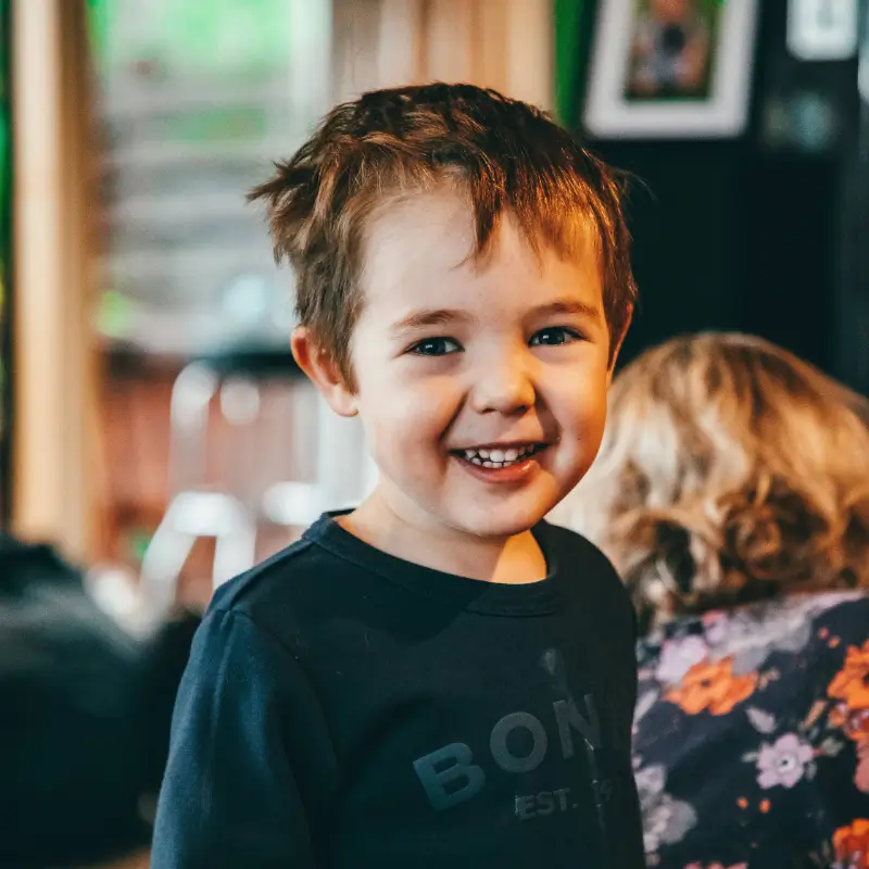 Smiling young client after a haircut